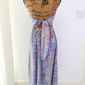 Floral dress with cutout.
